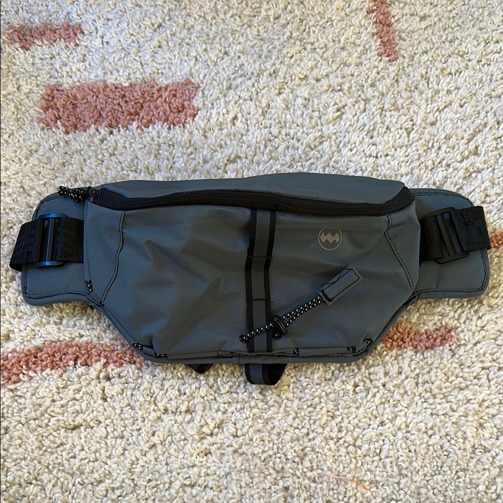 Janji Multipass Sling Bag. Color: Blue/Gray.